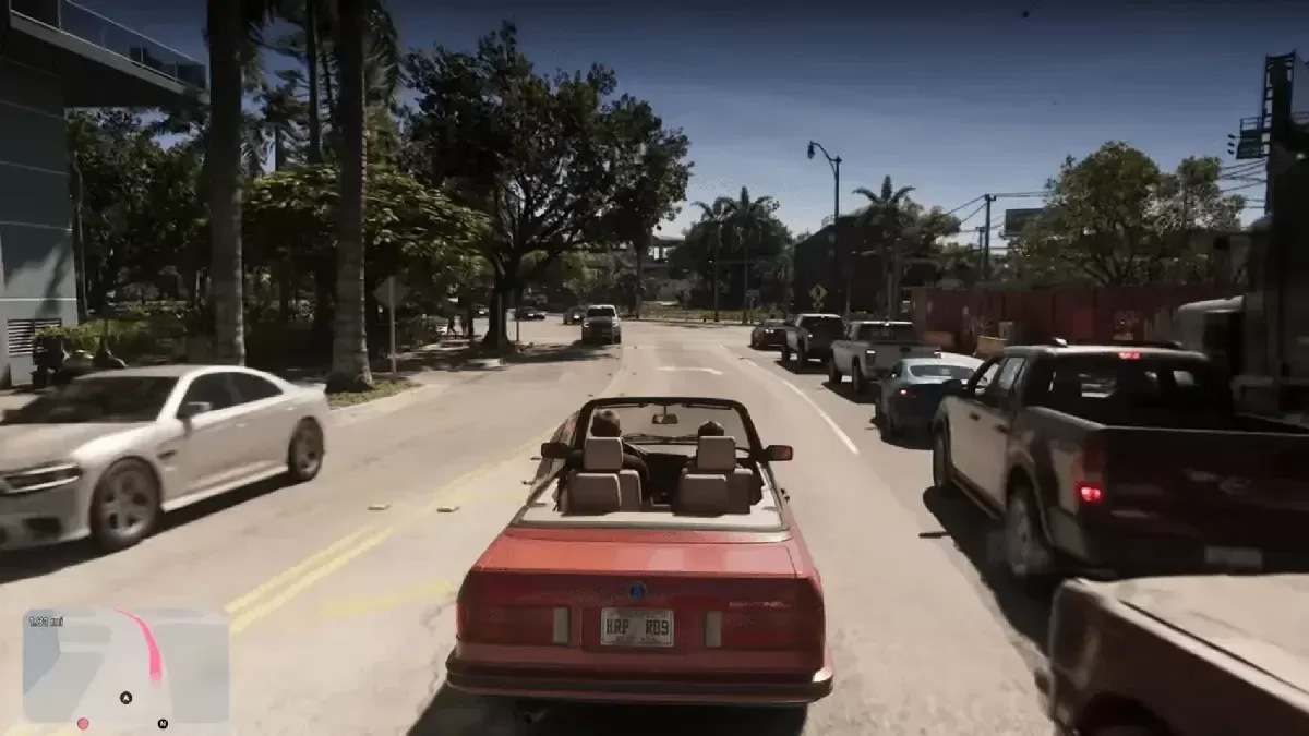 GTA 6 oyun görüntüsünde şehir caddesinde ilerleyen kırmızı üstü açık otomobil